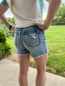 CURVY Judy Blue Medium wash cutoff shorts